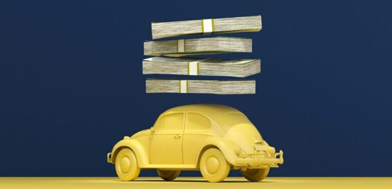 Yellow bug car with stacks of cash on top